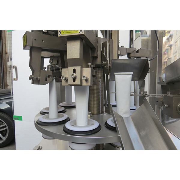 Машина для заповнення косметичних труб